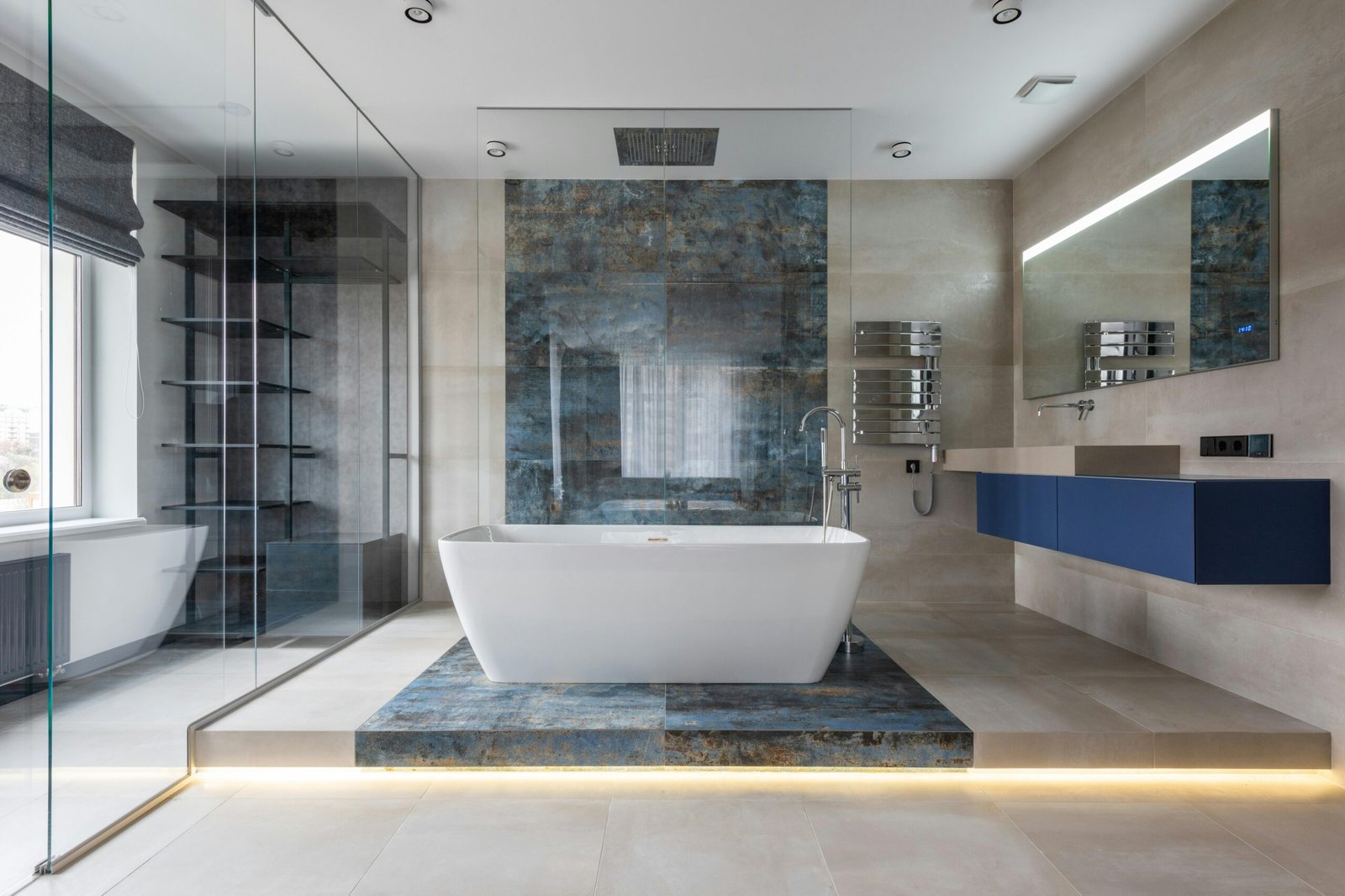 Compact urban bathroom design with walk-in shower and glass enclosure.
