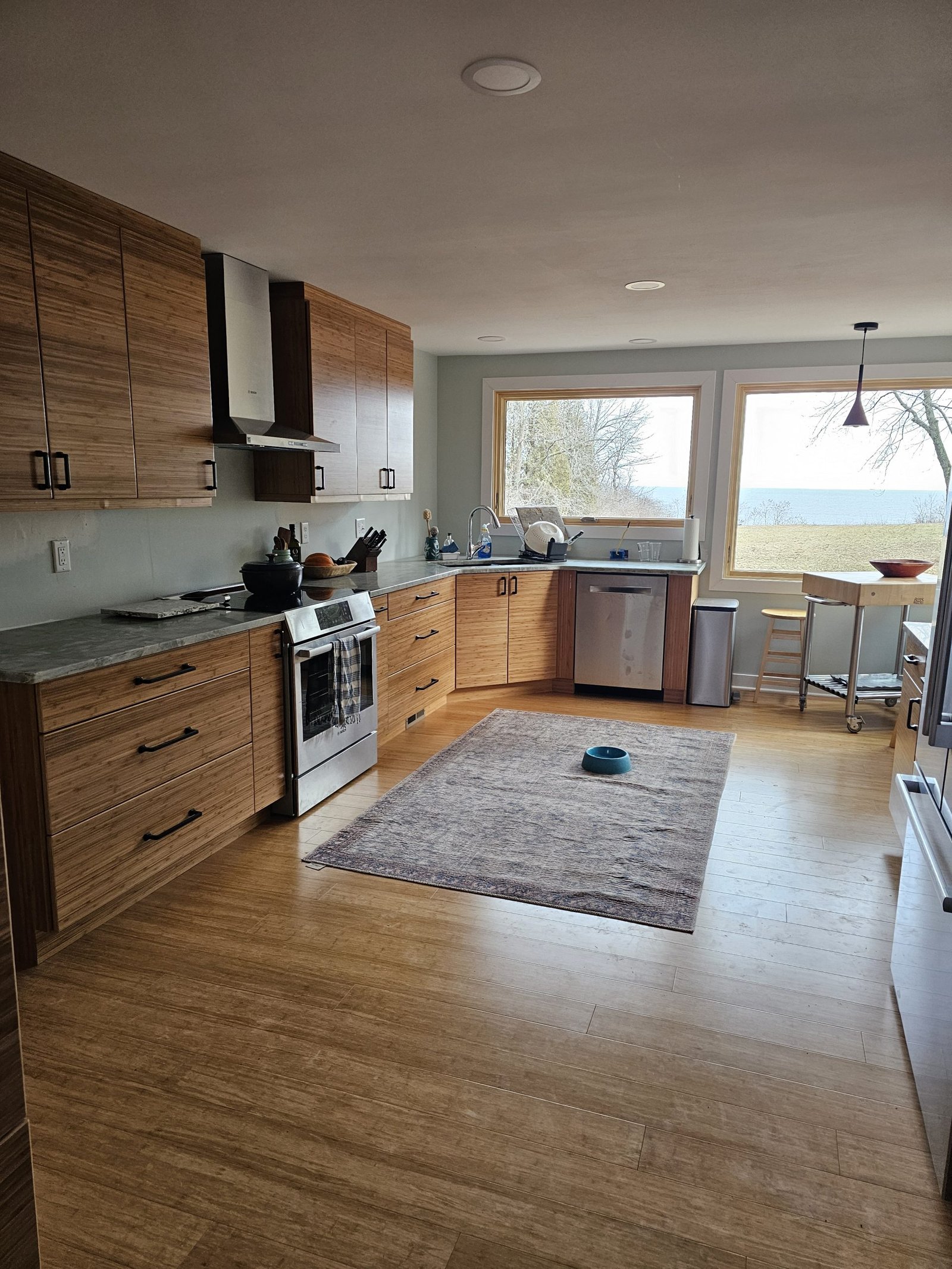 Eco-friendly hardwood floor in a bright and airy Mequon kitchen